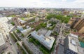 Aerial city view with crossroads and roads, houses buildings. Copter shot. Panoramic image. Royalty Free Stock Photo