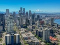 aerial city view of Seattle Downtown with skyscrapers in front and volcano Mount Rainier in background Royalty Free Stock Photo