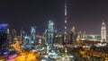 Aerial cityscape timelapse at night with illuminated modern architecture in Downtown of Dubai, United Arab Emirates. Royalty Free Stock Photo