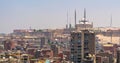 Aerial cityscape view of old Cairo, Egypt with old buildings and Citadel of Egypt in far distance