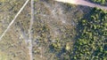 Aerial of clay road surrounded by brazilian caatinga vegetation, at sertao.