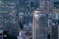 Aerial close up of modern buildings and skyscrapers