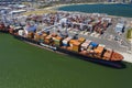 Aerial close-up photo of cargo ships at dock