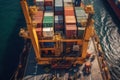 Aerial close up view of a cargo container ship. Fully loaded container ship at the cargo terminal in a seaport, port