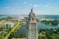 Aerial closeup of the Louisiana State Capitol Building and welcome center in Baton Rouge