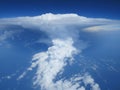 Aerial cloudscape of storm cloud, cumulonimbus and blue sky. Royalty Free Stock Photo