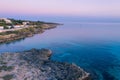 Aerial coastline sunset over mediterranean sea. Purple sky. Royalty Free Stock Photo