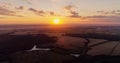 Aerial countryside view sunset landscape field sun Royalty Free Stock Photo