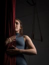 Aerial dancer woman focused on her performance at the circus