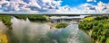 An aerial 180 degree panoramic view of a large dam.