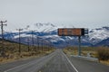 AERIAL: Digital sign above the empty highway signalling three exits are closed. Royalty Free Stock Photo