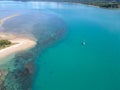 Aerial down view of Double Island, palm Cove looking into crystal clear water