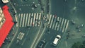 Aerial down view of a crosswalk and street intersection in the centre of Paris, France