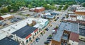 Aerial downtown Auburn Indiana with shop buildings