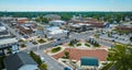 Aerial downtown Auburn with James Cultural Plaza and distant courthouse