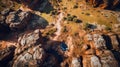 Aerial Dreamscape: Car Driving Through Canyon
