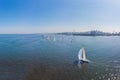 Aerial drone bird`s eye view of beautiful purple sail boat cruising in the Aegean open sea Royalty Free Stock Photo