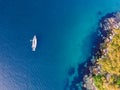 Aerial drone bird`s eye view of one sailboat yacht anchored at Store Beach near Quarantine Station in Manly Royalty Free Stock Photo