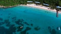 Aerial drone birds eye view of tropical island. Royalty Free Stock Photo