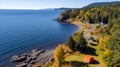 Aerial drone captures scenic beachside tent campsite with stunning view of the sea