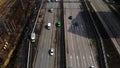 Aerial drone flight over road traffic. Follow shot of green wagon Royalty Free Stock Photo