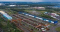 Aerial Drone Flight Photo over industrial zone of Kiev, Ukraine. Urban buildings, factory, power plant. Top view. Instagram