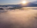 Aerial drone image of Beautiful harmony romantic color sunrise landscape scenery with sunlight and fog and Mount Kinabalu as Royalty Free Stock Photo