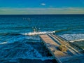 Aerial drone image of a hurricane Storm damaged Fishing pier on the Carolina coast