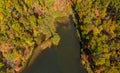 Top down aerial view of Coopers Rock Lake in the state park with autumn and fall colors