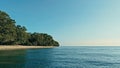 Aerial drone image of a remote south pacific island with sandy beach shore and beautiful ocean sea seascape and lush tropical Royalty Free Stock Photo