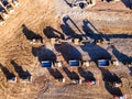 Aerial drone image of a construction site. Heavy equipment dump trucks, bulldozers and excavators at the construction Royalty Free Stock Photo