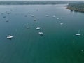 Aerial drone image of a windy and foggy day over Rockland Harbor in Maine