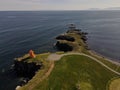 Aerial drone landscape of cliffs and lighthouse of Grimsey Island in Arctic Circle North Iceland