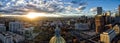 Aerial Drone Panorama - Stunning golden sunset over the Colorado state capital building & Rocky Mountains, Denver Colorado.