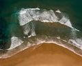 Aerial drone panorama view of idyllic nature landscape ocean waves crashing on Praia da Cordoama beach Algarve Portugal Royalty Free Stock Photo