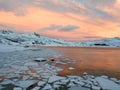 Aerial drone panoramic view. Beautiful sunset over the mountains and sea of the Lofoten Islands. Reine, Norway. Winter landscape w Royalty Free Stock Photo