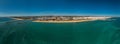 Aerial drone panoramic view of Vilamoura and Quarteira cities on the Algarve coast of southern Portugal on a sunny day