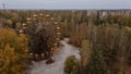 Aerial drone photo of the abandoned attraction park with feris wheel at Pripyat ghost town Royalty Free Stock Photo