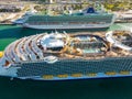 Aerial drone photo Allure of the Seas at Port Miami full of tourists traveling