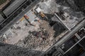 Aerial drone photo of demolition site and construction workers