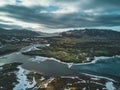 Aerial drone photo of a empty lake a huge volcanic mountain Snaefellsjokull in the distance, Reykjavik, Iceland.