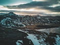 Aerial drone photo of a empty lake a huge volcanic mountain Snaefellsjokull in the distance, Reykjavik, Iceland.