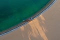 Aerial drone photo of men practicing SUP or Stand Up Paddle surf board