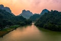 Aerial drone photo - Mountains and lakes of northern Vietnam at sunset.
