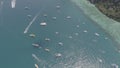 Aerial drone photo of sailing boats and yachts in the bay of iconic tropical Phi Phi island Royalty Free Stock Photo