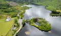 Aerial drone landscape of St. Finbarr oratory Church, Gougane Barra, cork West Ireland.