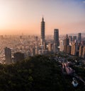 Aerial drone photo - Sunset over Taipei skyline. Taiwan. Taipei 101 skyscraper featured. Royalty Free Stock Photo