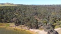 The aerial drone point of view footage high angle to low angle at Bowna Waters Reserve is natural parkland on the foreshore.