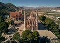 Aerial drone point of view Sanctuary of Santa Maria Magdalena monastery raises among mountains in Novelda spanish town, Art
