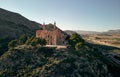 Aerial drone point of view Sanctuary of Santa Maria Magdalena rises among top of rocky mountain in Novelda town, spanish Art